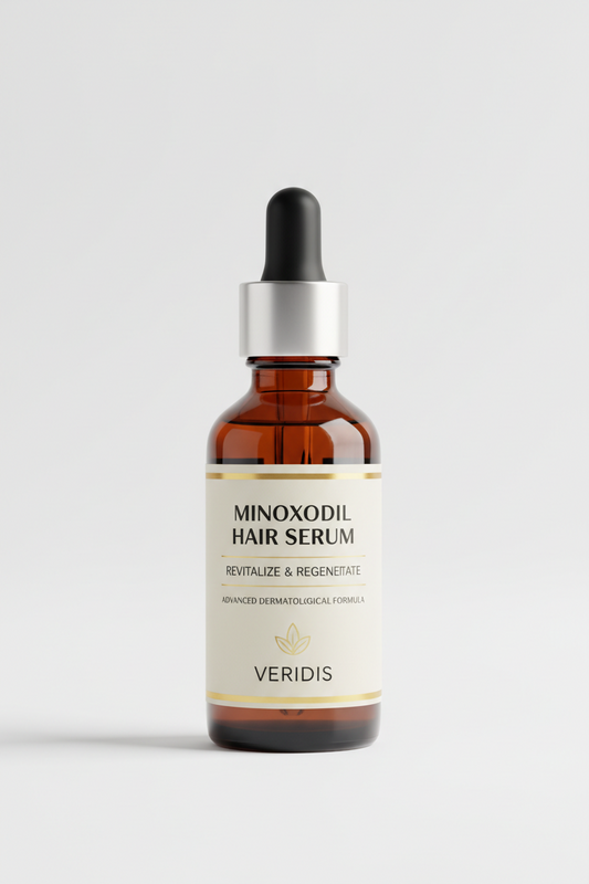 Front view of amber glass dropper bottle of Minoxidil hair serum showing label text ‘Minoxidil Hair Serum, Revitalize & Regenerate’ on white background